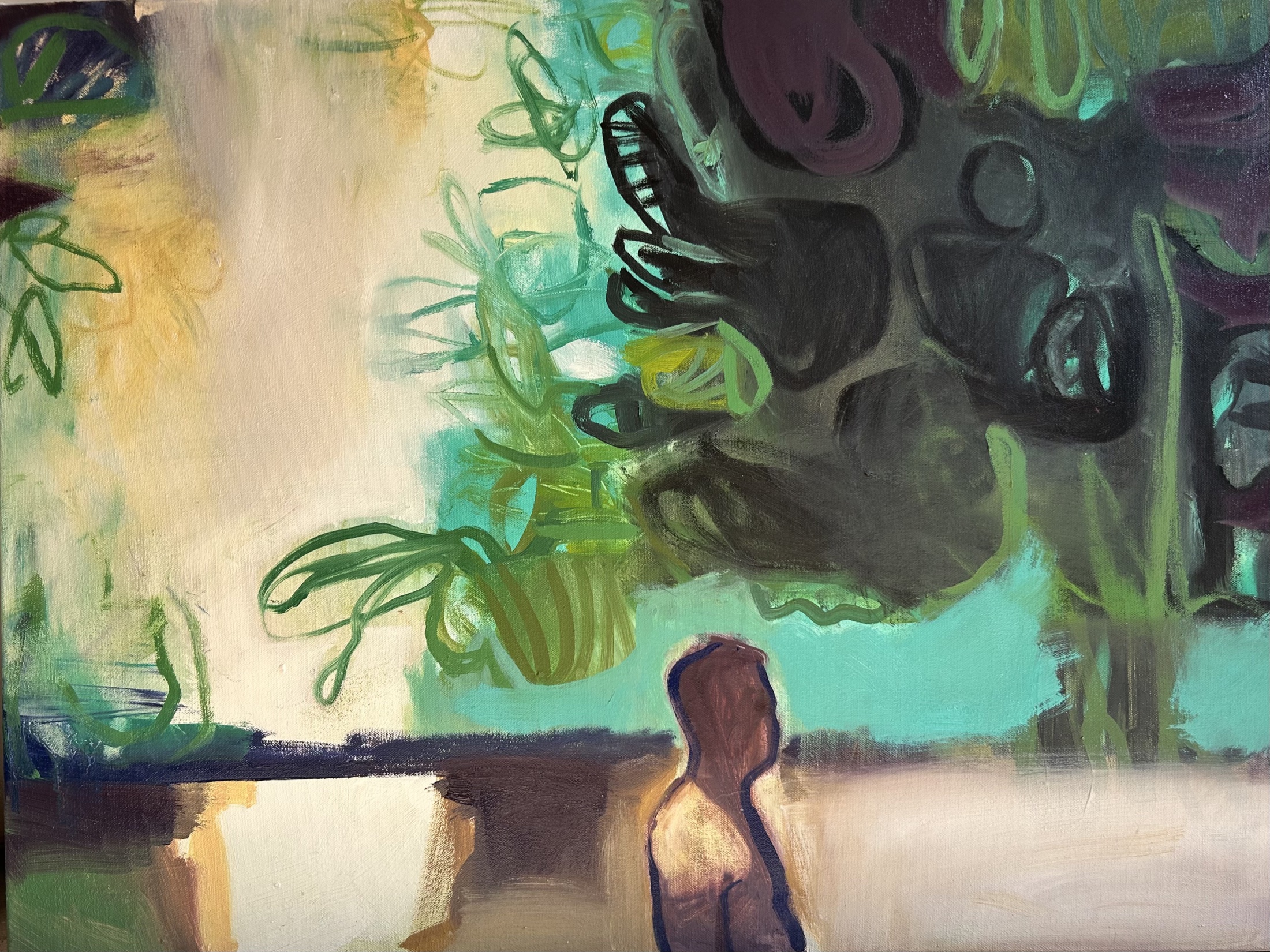 Figure below dark organic shapes in turquoise and green